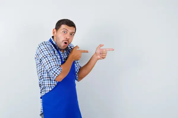 Professional garage door repair technician working on residential garage door in Bridgeport, CT